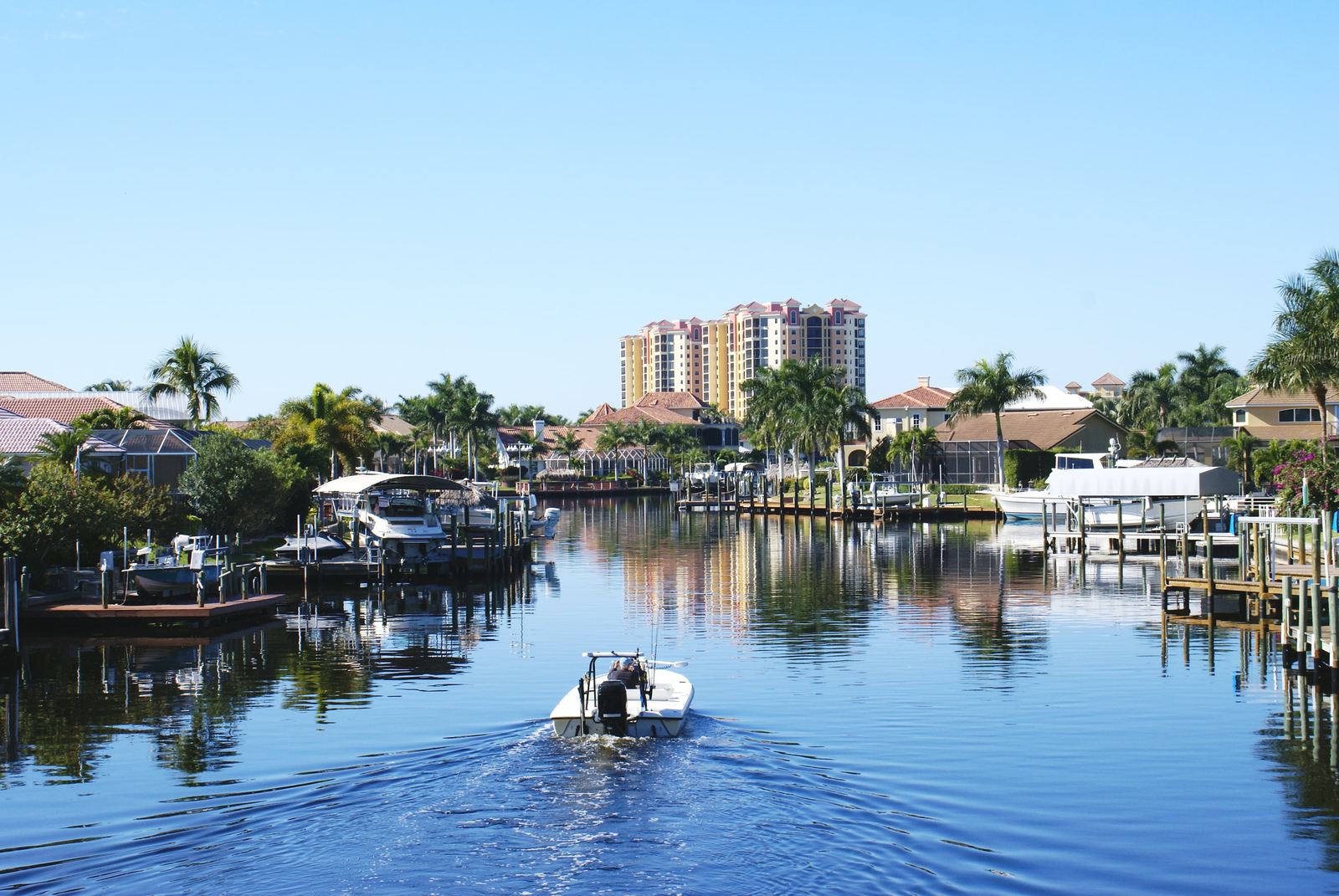 Siesta Key residential canal with private docks and waterfront condominium